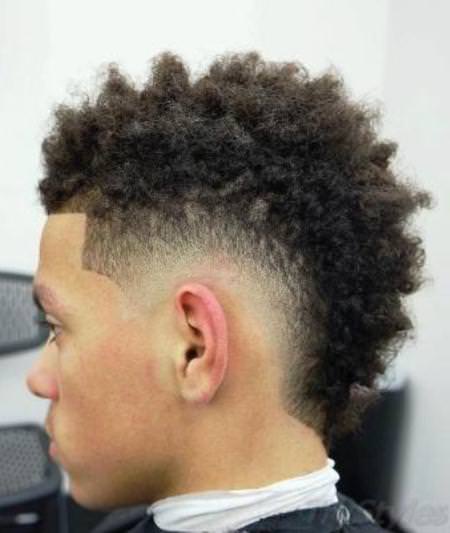 Natural curls with fade shave mohawk hairstyles