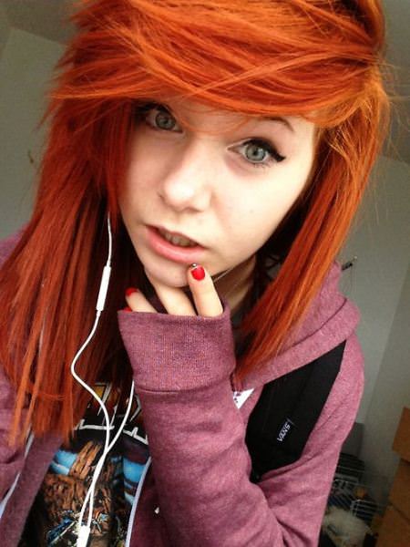 Orange hair with heavy side bangs emo styles for girls