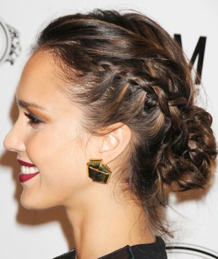 Side braid with a low knot braided hairstyles