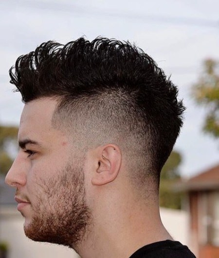 Upswept curls with tapers sides mohawk hairstyles