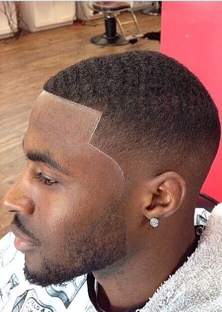 Wavy low fade haircuts for black men