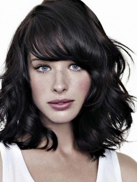 casual and curly medium length haircuts with bangs