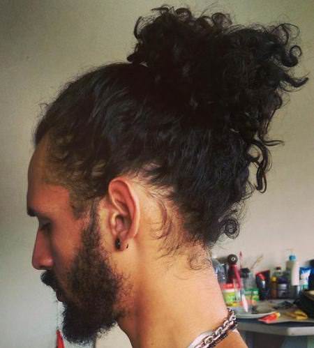 curly ponytail long hairstyles for men