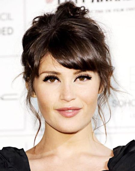 messy updo with side bangs hairstyles for girls