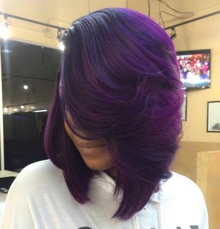 mysterous purple black waves medium length haircuts with bangs