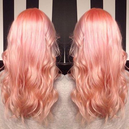 pastel pinkish and tangerine tints shades of strawberry blonde hair color