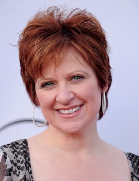red pixie with choppy layers haircuts for women over 50