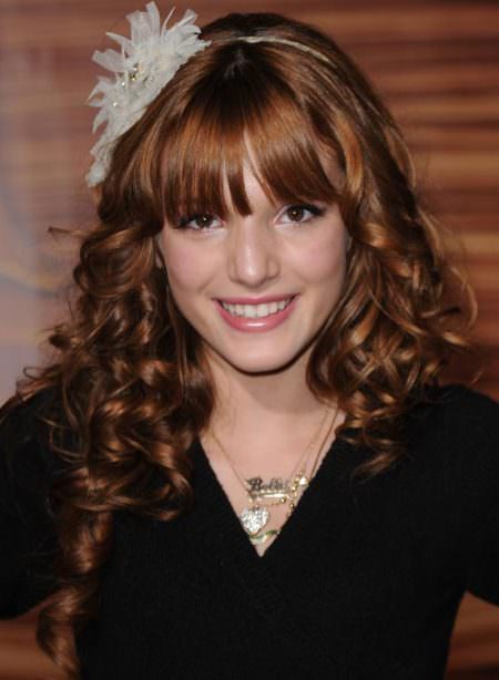 spiral curls with even fringes curly hairstyles for girls