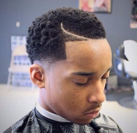 taper fade with kinky curls black men hairstyles