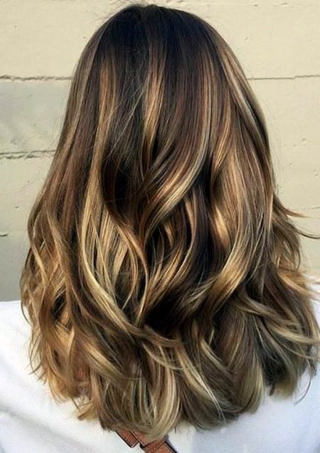 wild layers with color pops shoulder length haircuts
