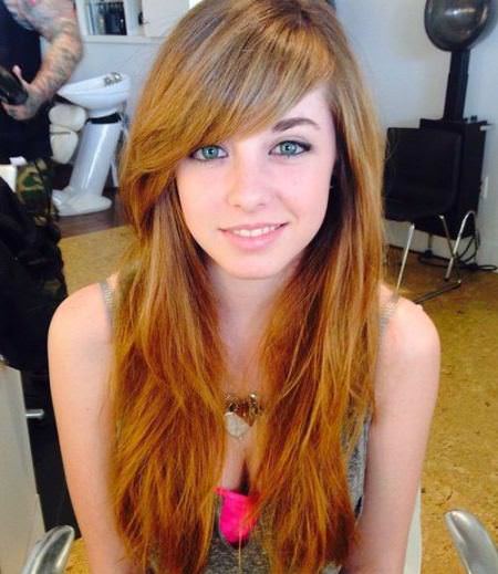 Ginger brown shaggy layers layered haircut with bangs