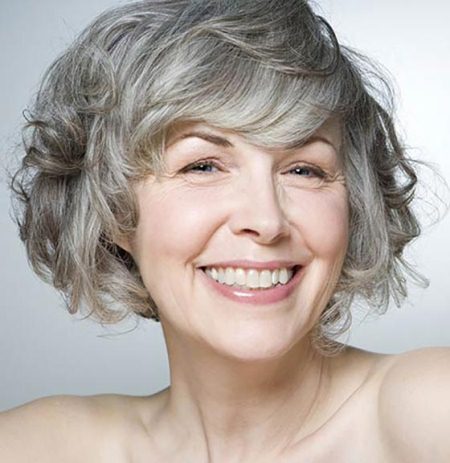 Silver side swoop hairstyles for women over 50