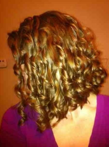 caramel colored spirals curly bob hairstyle