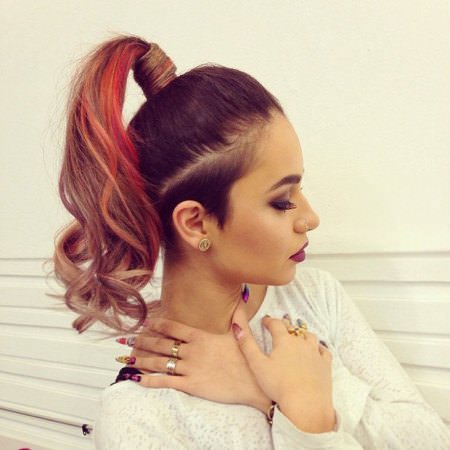 colorful high ponytail for wavy hair christmas and new year eve hairstyles