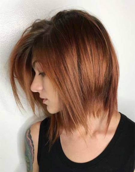 coppered layered bob with bangs different long bob with bangs