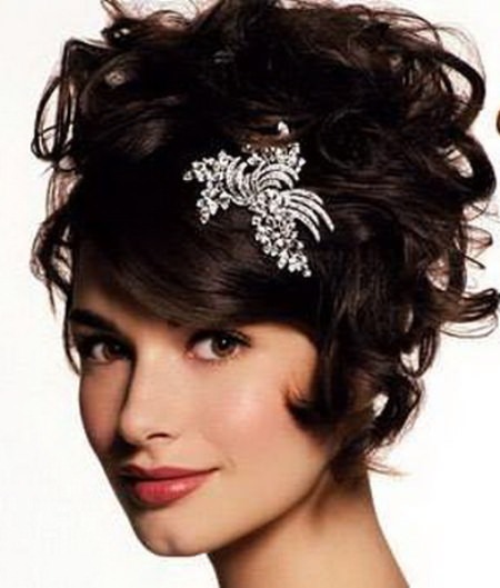 high curly Updo with embellished hairpin prom hairstyles for short hair