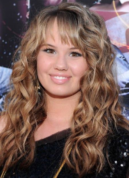 long curls with soft bangs hairstyles for thick hair
