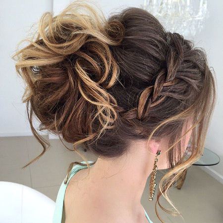 messy bun with long side pieces Updos for long hair