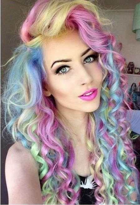 pastel colored curls with a side part long curly hairstyles