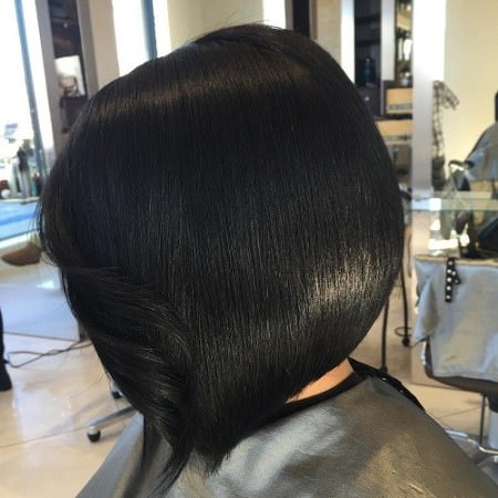 short bob with a signature curl short straight hairstyles