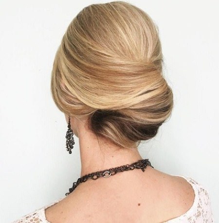 sleek chignon hairstyles for wedding guests