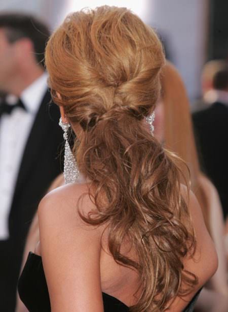 wavy low ponytail with twisted sides hairstyles for shoulder length hair