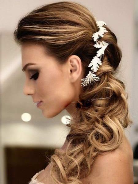 Low side ponytail with floral pieces wedding hairstyles for long hair
