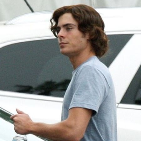Medium Mens haircut for curly hair Zac Efron Hairstyles