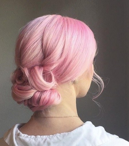 Powder pink low bun hairstyles