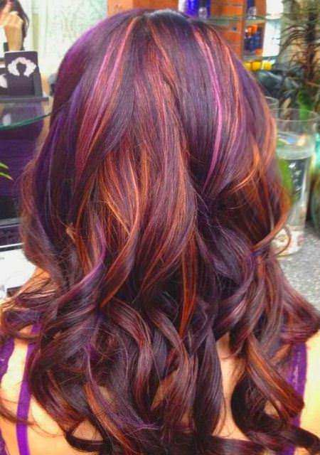 Thick waves with multicoloered highlights style curly hair