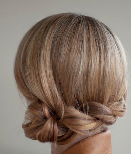 Twisted side roll messy bun hairstyles for prom