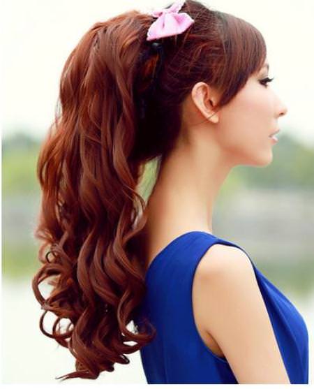 casual wavy ponytails with a bow