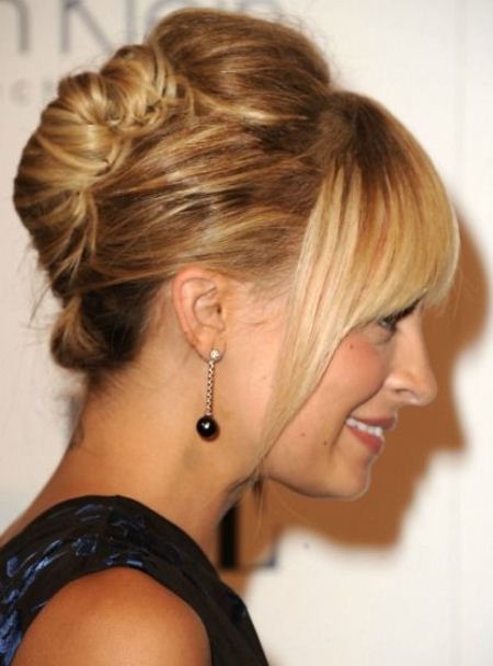 classic roll updo bun hairstyles for long hair