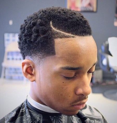 high top fade with a curvy part curly hairstyles for black men