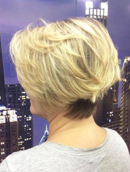 layered blonde hair with dark underside hairstyles for older women