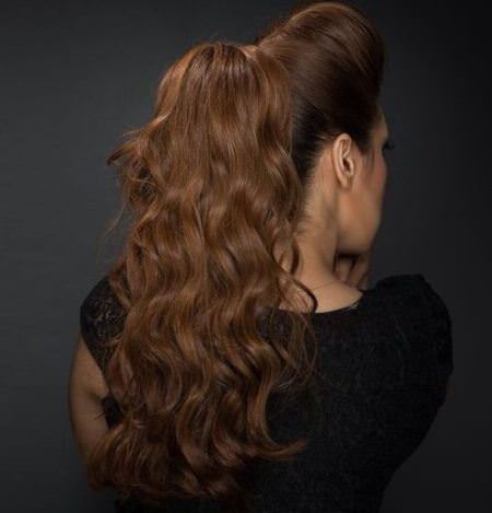 long wavy ponytails with a high bouffant