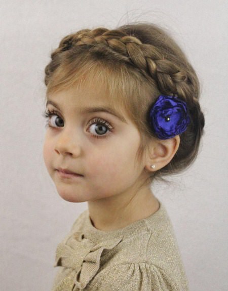 loose crown braid with a floral hairpin braids for kids