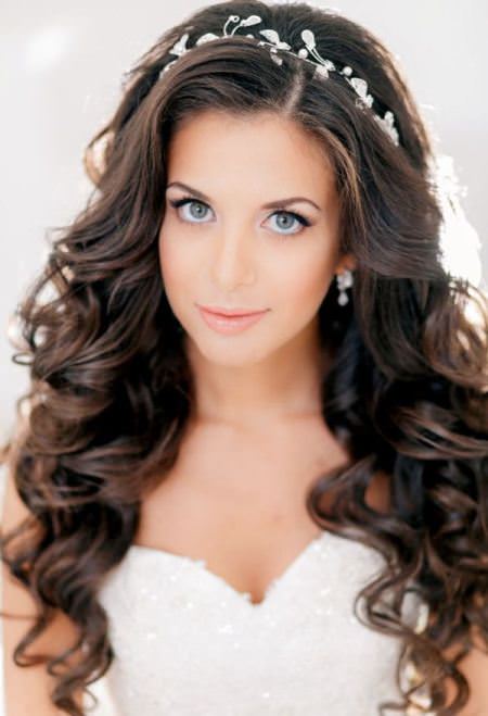 loose curly hair with sparkling headband wedding curly hairstyles