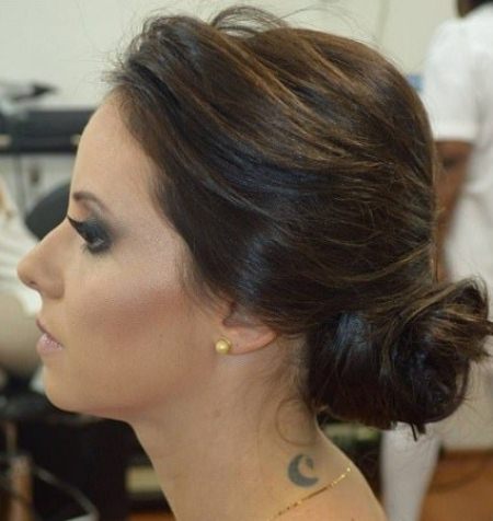 side bun with up swept bangs side bun hairstyles