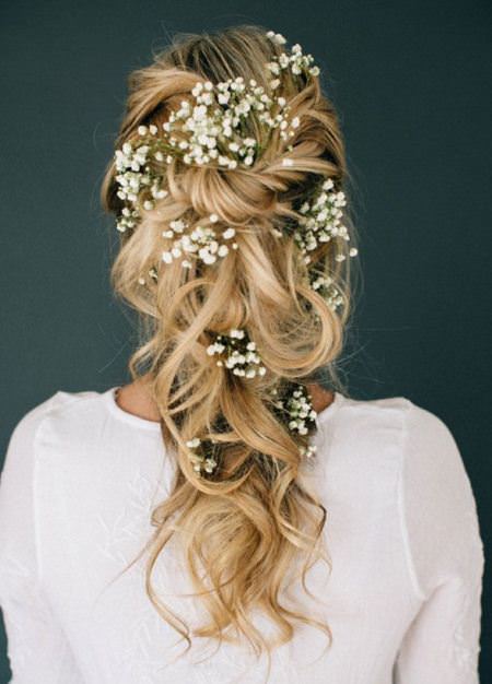 textured ponytail with twisted and pinned hair bridal hairstyles