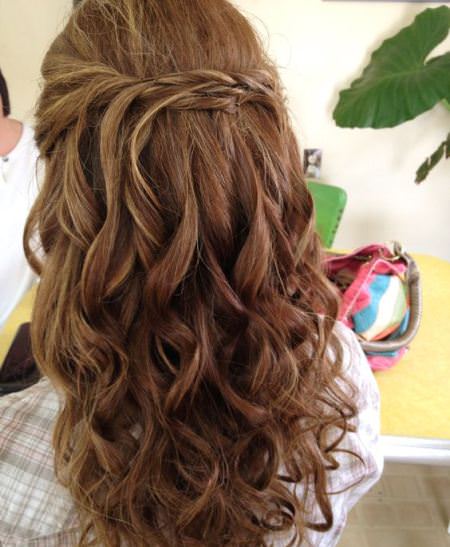 twist and pin half hairstyle style curly hair