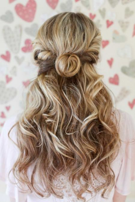 twisted half bun with curly waves bridal hairstyles