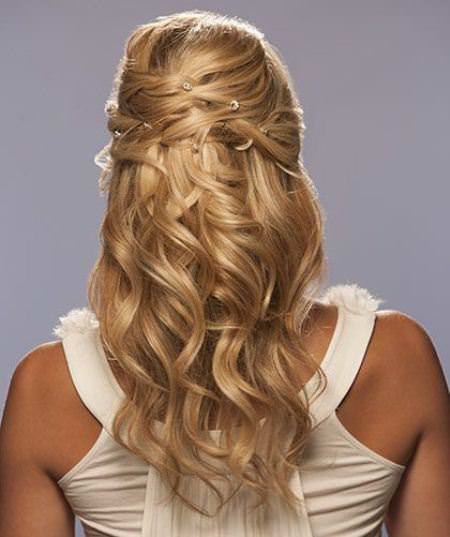 twisted sides with waves beach wedding hairstyles