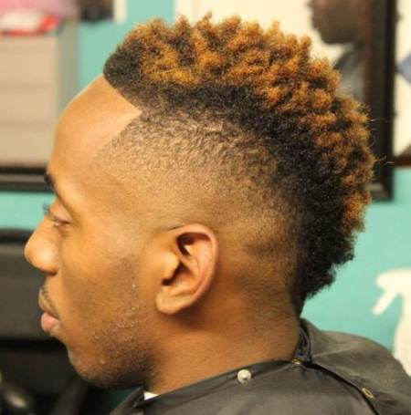 two tone curly mohawk with fade curly hairstyles for black men