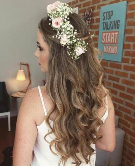 Floral crown half up and half down wedding hairstyles