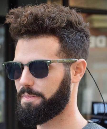 Long curly top and short sides hairstyles for men with thick hair