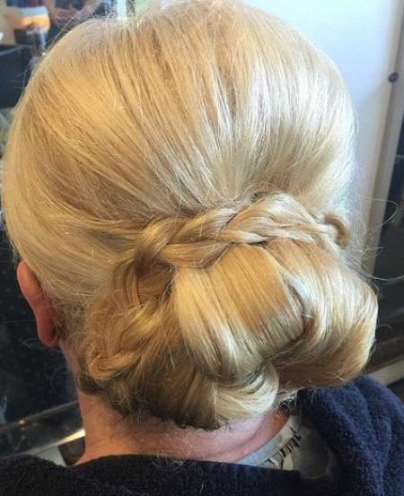 Low bun with encircling updos for women over 40