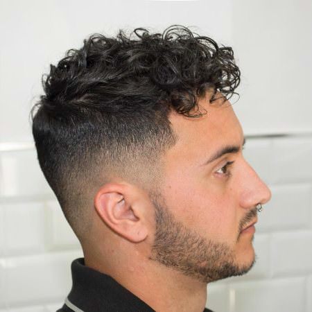 curled pompadour hairstyles for men