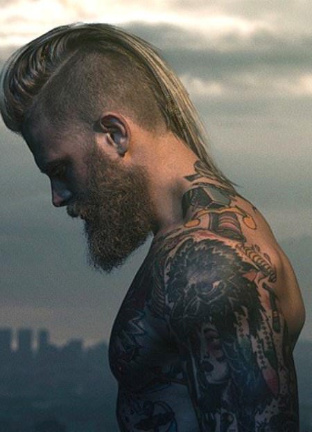 long hair, full beard and shaved side mohawk hairstyles for men