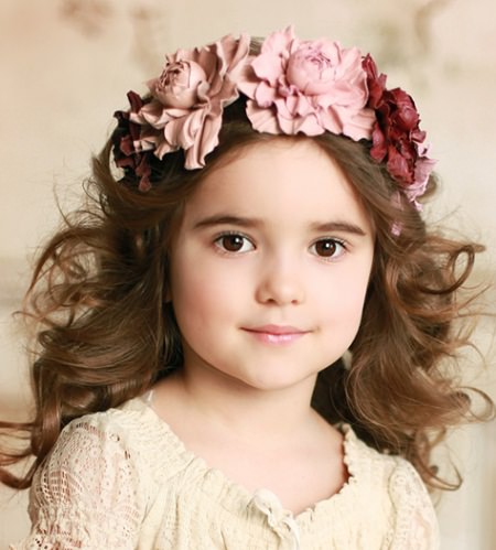 outward waves with floral headband baby girl hairstyles